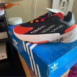 Adidas brand new cheetah orange shoe